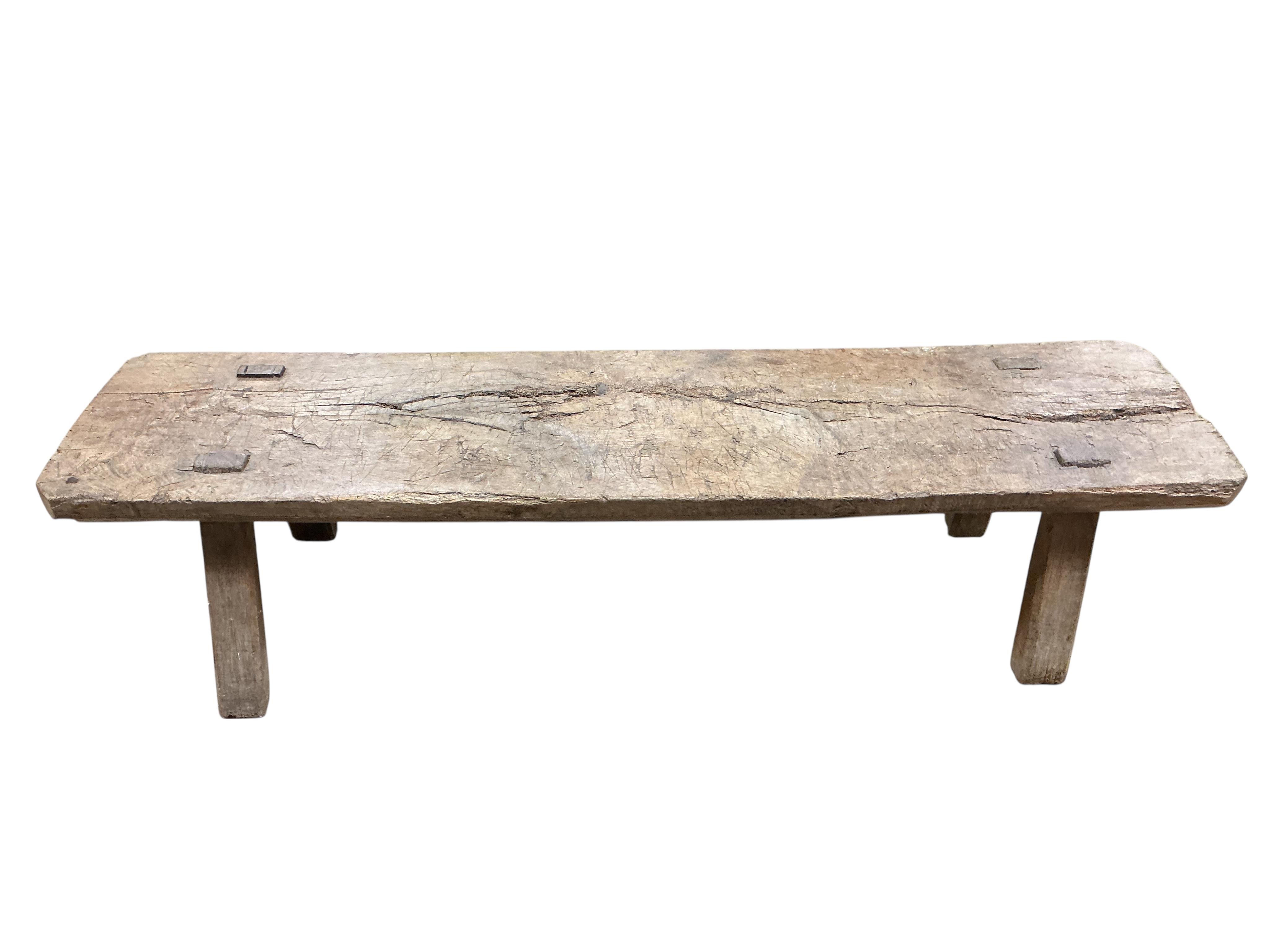 An 18th century oak bench, width 180cm, depth 45cm, height 43cm